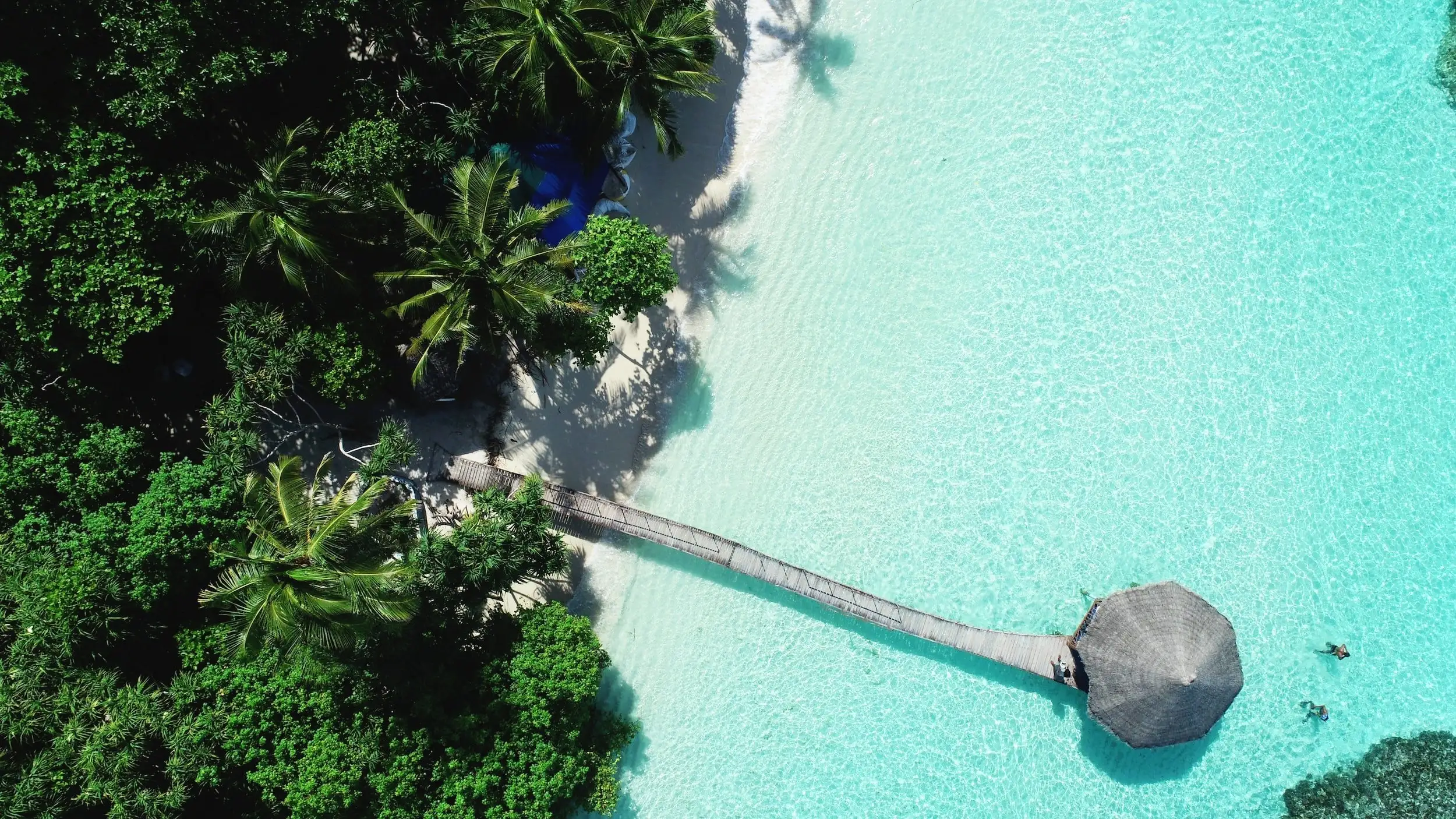 Crystal-clear turquoise water at a tropical beach resort